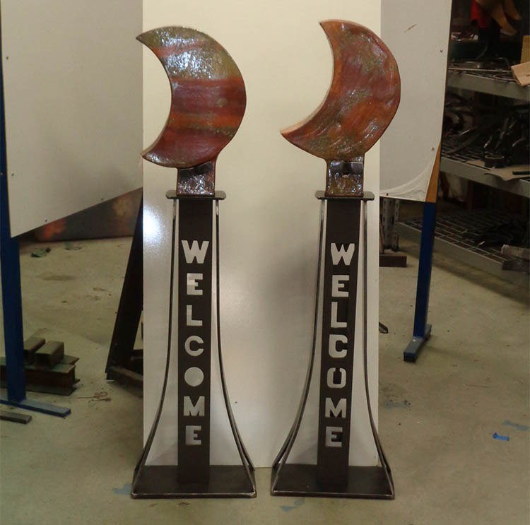 Forged metal welcome sculptures