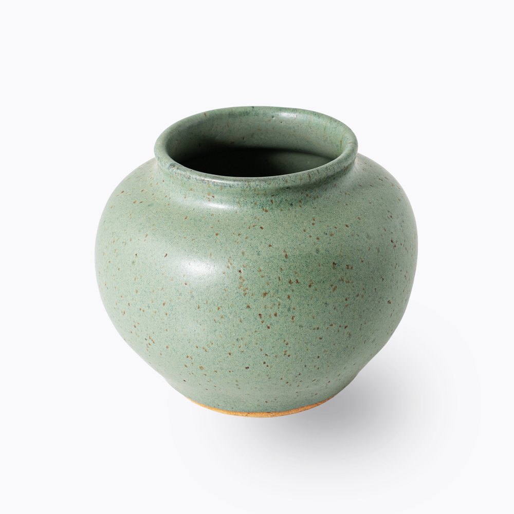 Rounded green ceramic vessel